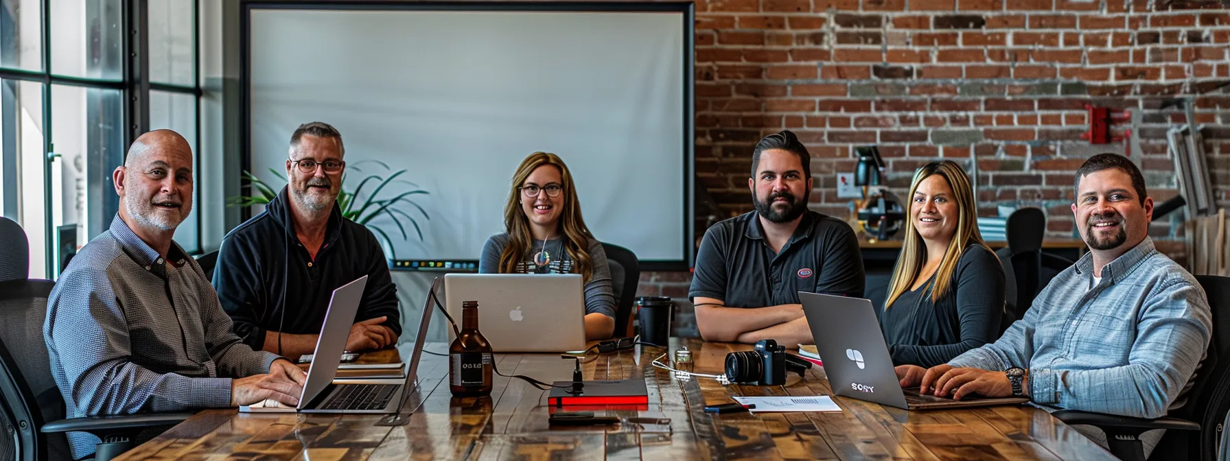 a team of experts collaborating on a sleek, modern website design for a peoria business, capturing the essence of local market trends and customer needs. a team of experts collaborating on a sleek, modern website design for a peoria business, capturing the essence of local market trends and customer needs.