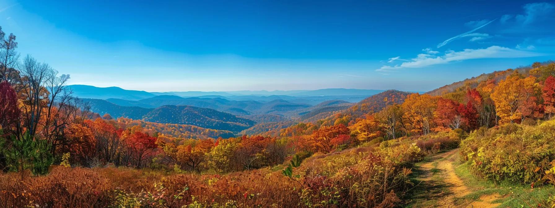 a vibrant autumn scene in the blue ridge mountains captures a panoramic view of colorful fall foliage blanketing the rolling hills, with a clear blue sky overhead and a winding hiking trail inviting exploration. a vibrant autumn scene in the blue ridge mountains captures a panoramic view of colorful fall foliage blanketing the rolling hills, with a clear blue sky overhead and a winding hiking trail inviting exploration.
