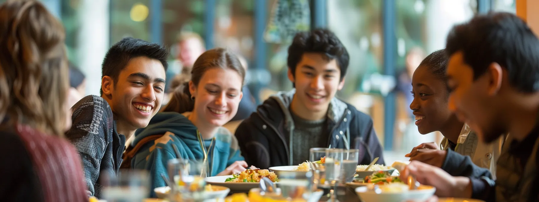 students from different countries sharing a meal together in an international club.