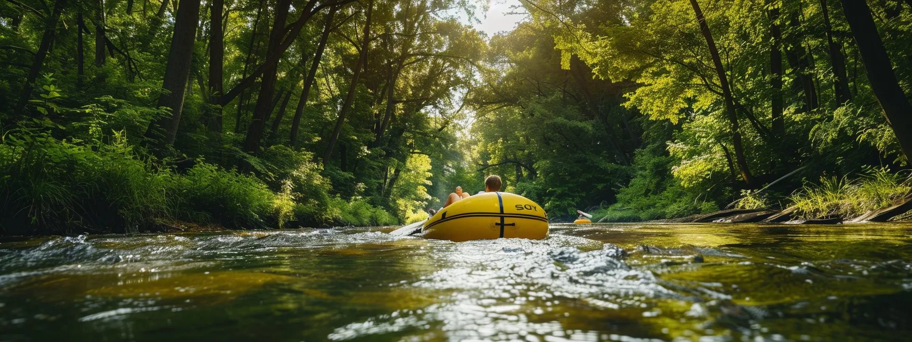 tubing down the apple river in wisconsin, surrounded by lush landscapes and clear waters.