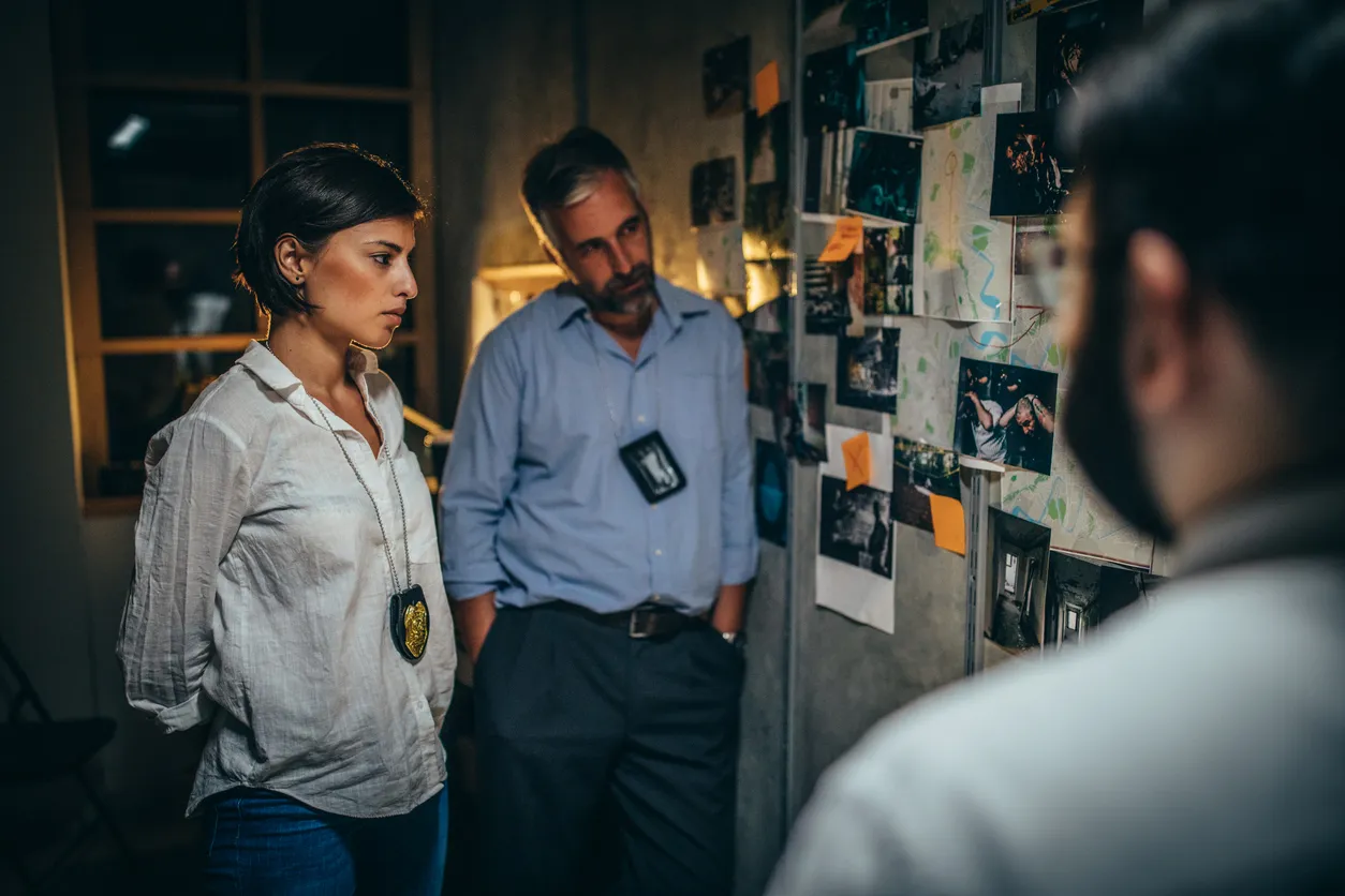 private investigators discussing a case in Derby