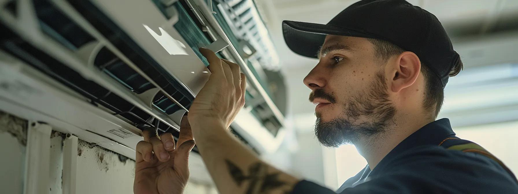 HVAC technician fixing the air conditioner