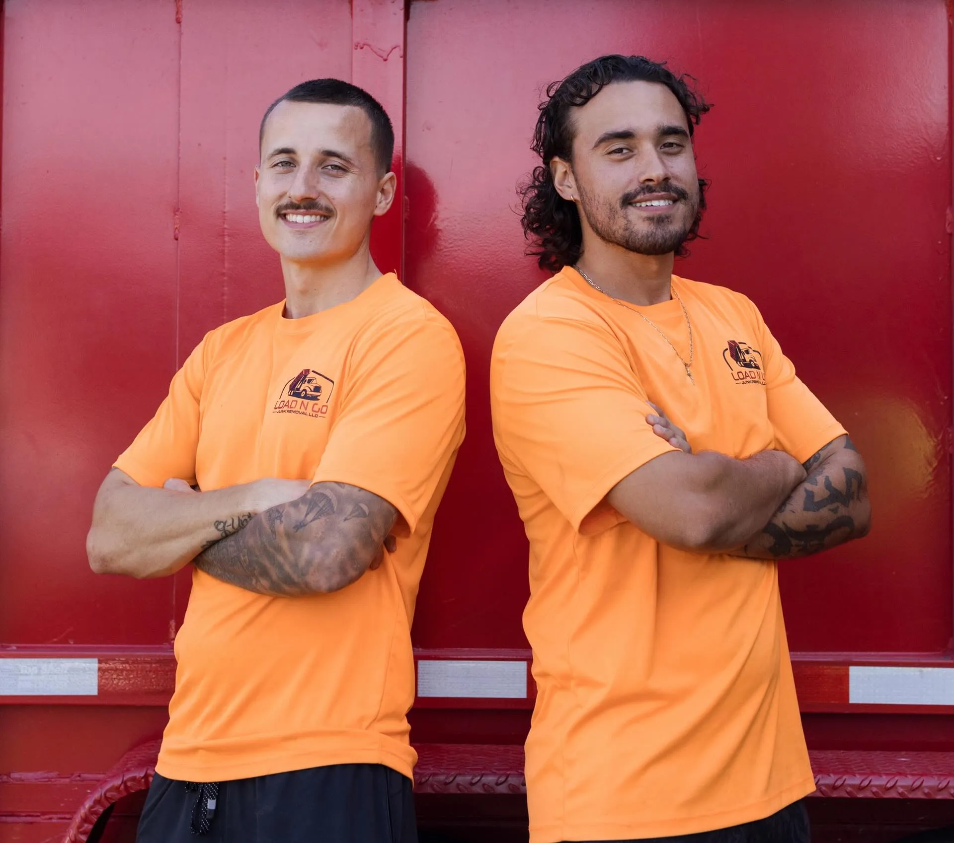 Load N Go Junk Removal owners Daniel and Jarrod Szukics providing construction debris removal services.