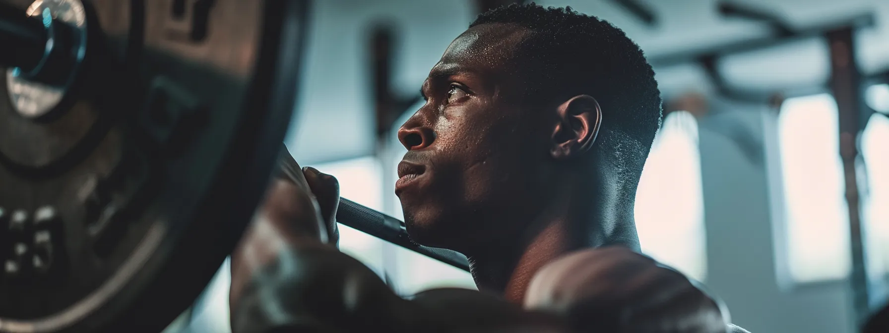 a person confidently lifting weights in a gym, showcasing their lean physique and embracing their ectomorph strengths.