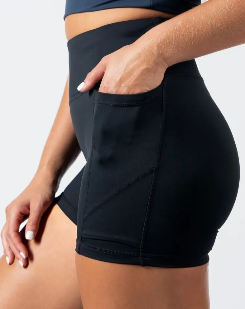 Close up of black Baseline Shorts in Lux Fabric, showing off pocket