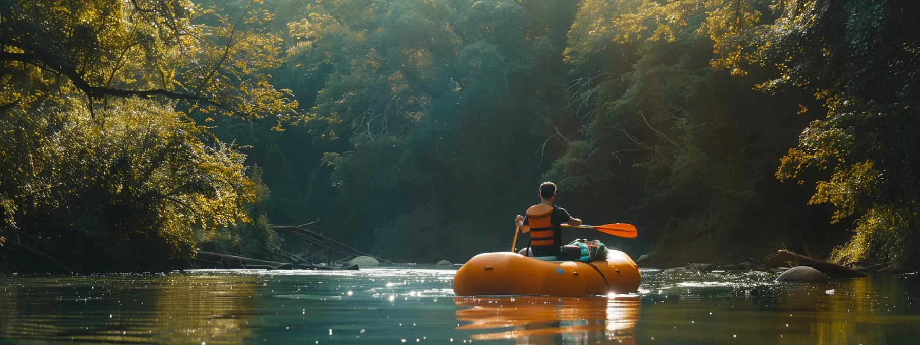 a person on a raft holding a uv water purifier.