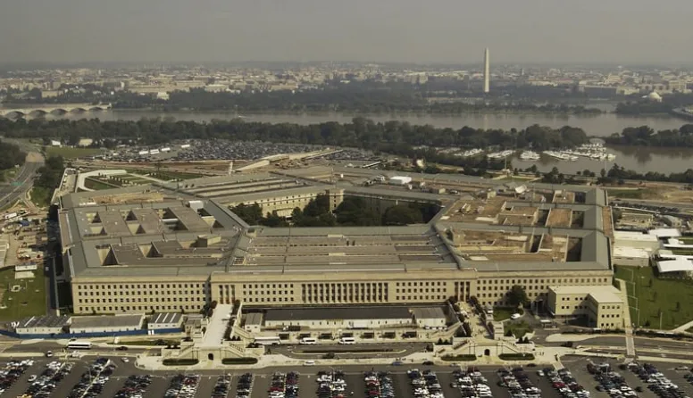 aerial view of the US Pentagon with parking and the Washington Minument in the background aerial view of the US Pentagon with parking and the Washington Minument in the background