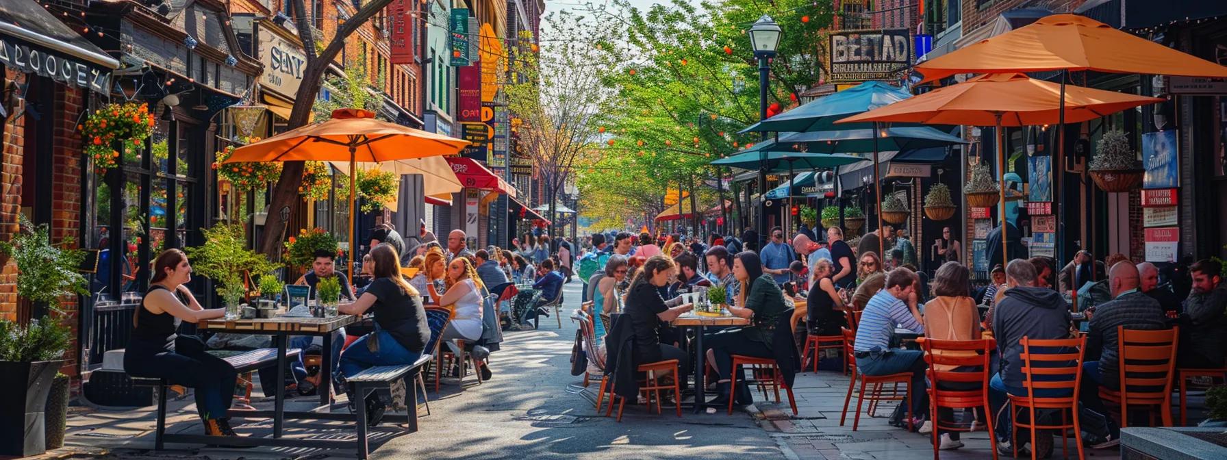 a bustling urban street scene in ducktown, showcasing an inviting restaurant with colorful outdoor seating, historical architecture in the background, and families enjoying local cuisine amidst the vibrant market atmosphere.