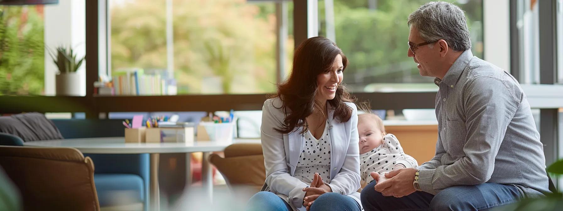 a concerned parent engages in a focused discussion with a pediatrician in a modern, well-lit office, highlighting the importance of seeking professional advice for infant developmental milestones. a concerned parent engages in a focused discussion with a pediatrician in a modern, well-lit office, highlighting the importance of seeking professional advice for infant developmental milestones.