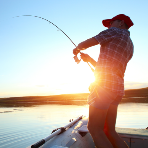 Man Fishing at Sunset