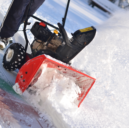 Pushing Snowblower