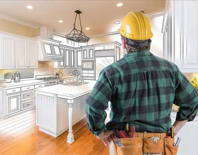 Contractor reviewing a kitchen plan