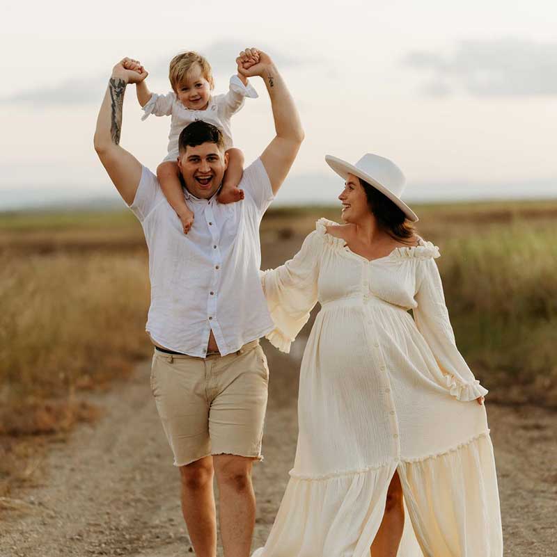 Profile picture from review by parents. Dad piggybacks child while mum walks beside.