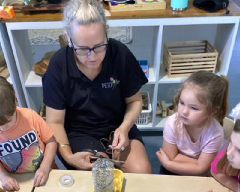 Educator Roslyn Watson from Petit ELJ Marian engages children with recycled arts and crafts.