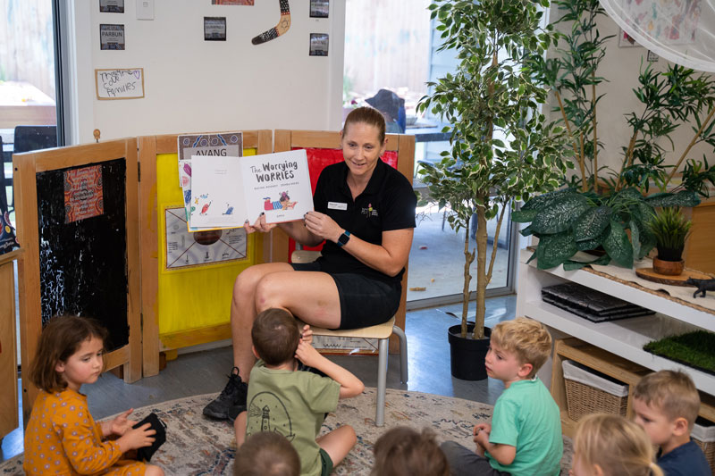 A Petit Early Learning Journey educator reads the book, The Morning Worries to children to encourage them to discuss their feelings and support them through anxiety and big life changes.
