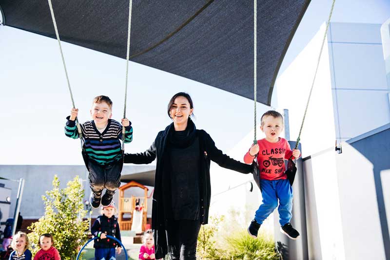 Float Educator supervises outdoor play.