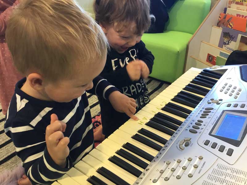 Children play with musical instruments - fun and educational music and movement activities for toddlers.