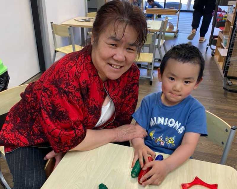 A grandmother and child at a early childhood service event celebrating the role of grandparents in our life.