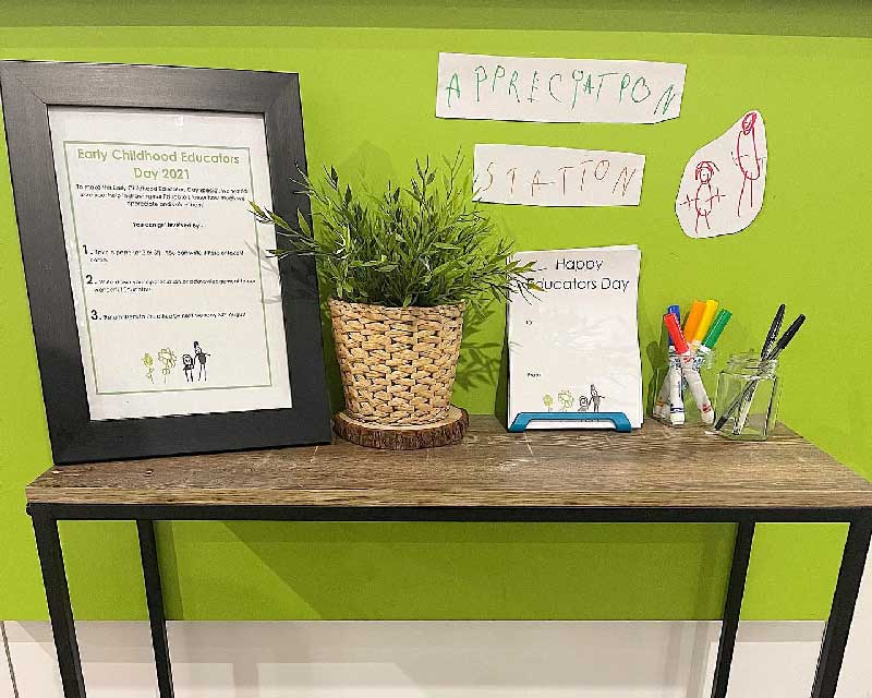 An appreciation station for Educators' Day where families and peers can write personal notes to celebrate and say thank you to our educators.