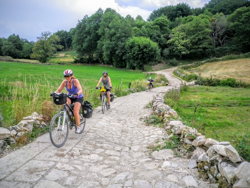 The Best Cycling Routes in Portugal, from the Coast to the Mountains - Group of friends cycling the Camino de Santiago in Galicia, Northern Spain