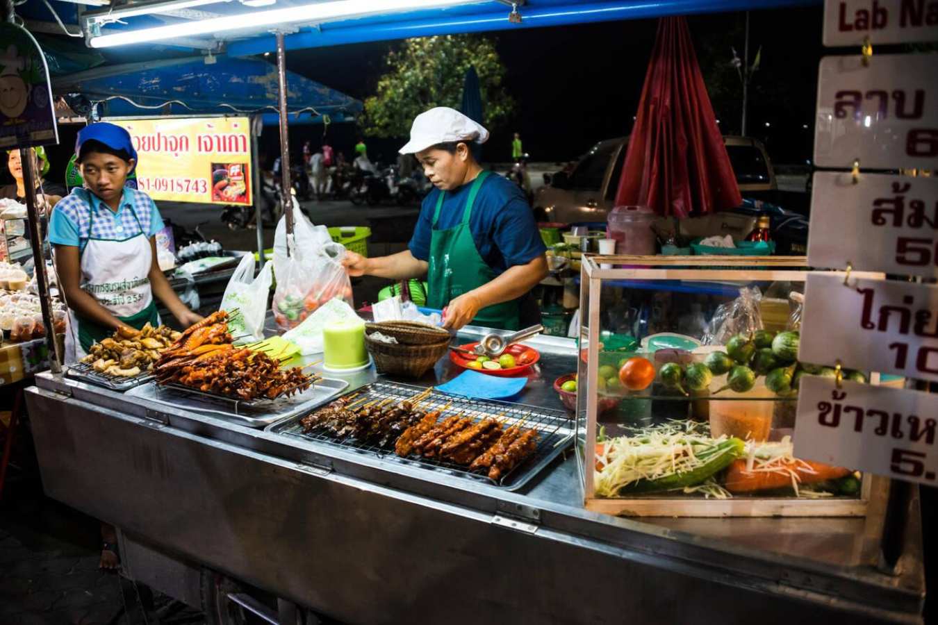 food stall selling somtam at the night market