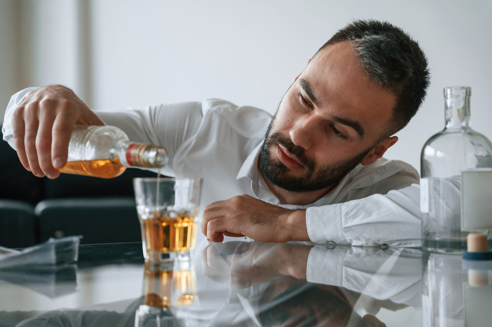 man with alcohol addiction needs drug rehab treatment