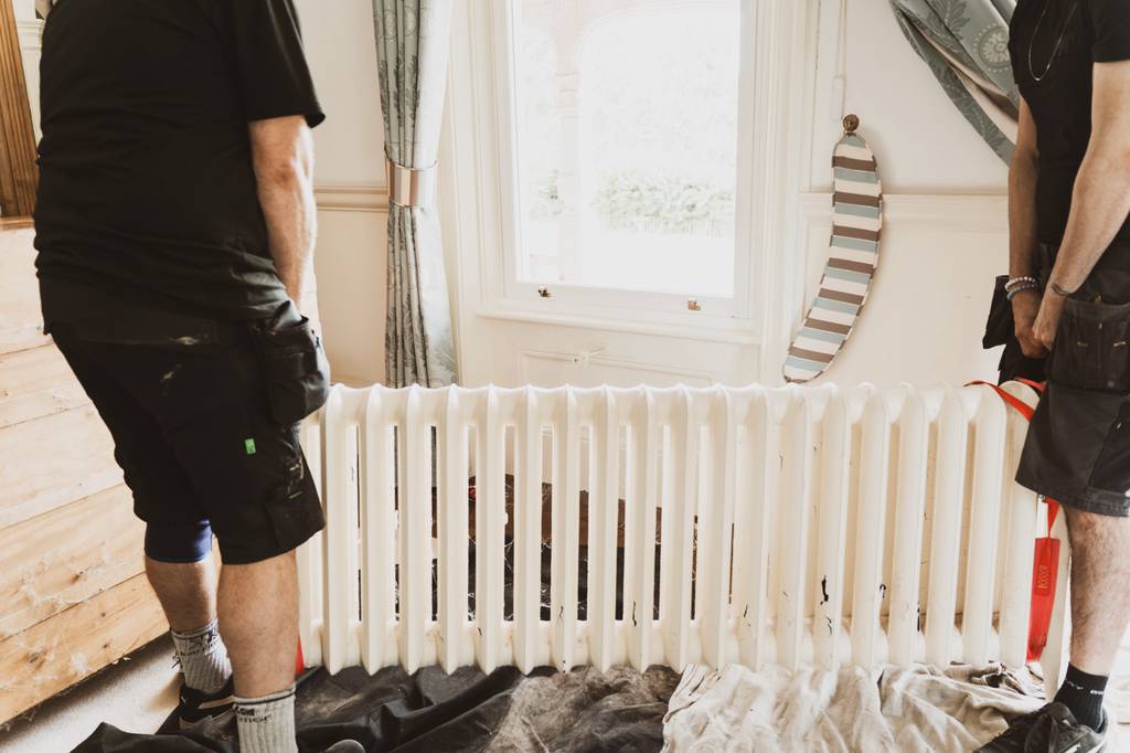 WLV heating engineers relocating a radiator