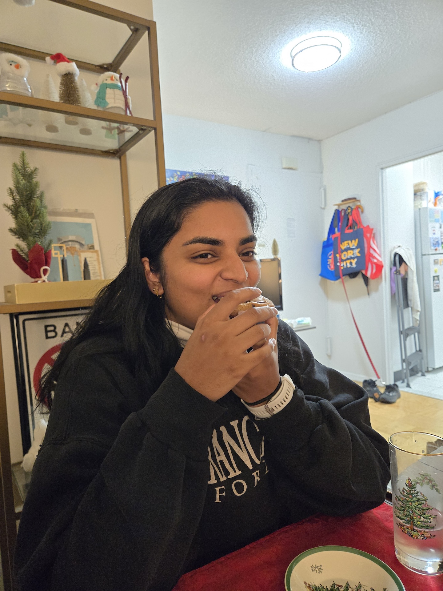 Photo of Deb enjoying a cookie from Samir