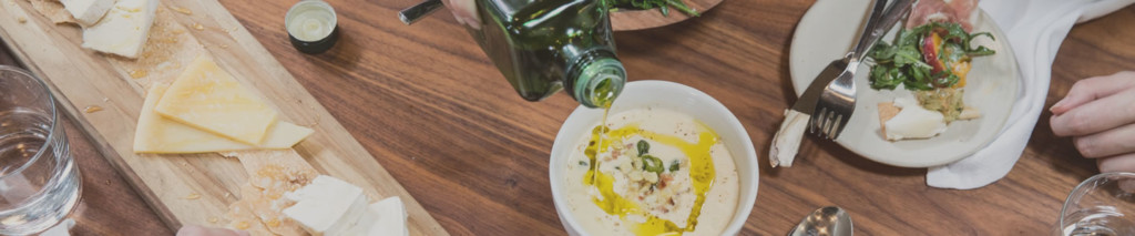 Cauliflower soup topped with a drizzle of olive oil 