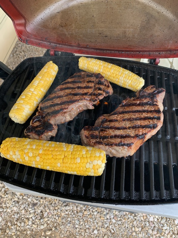 Grilling steaks outdoors