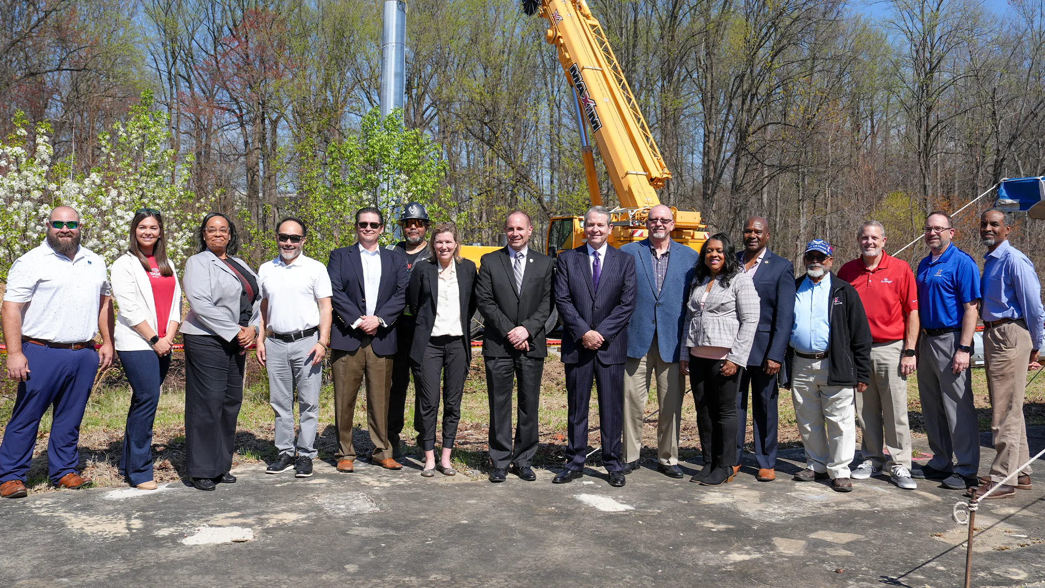 Deputy Garrison Commander Brian Foley, AAFES Vice President of Services Operations Carla McDowell and Boingo CEO Mike Finley are joined by their respective teams and partners to celebrate the deployment of a new Boingo cellular tower at Fort Meade.