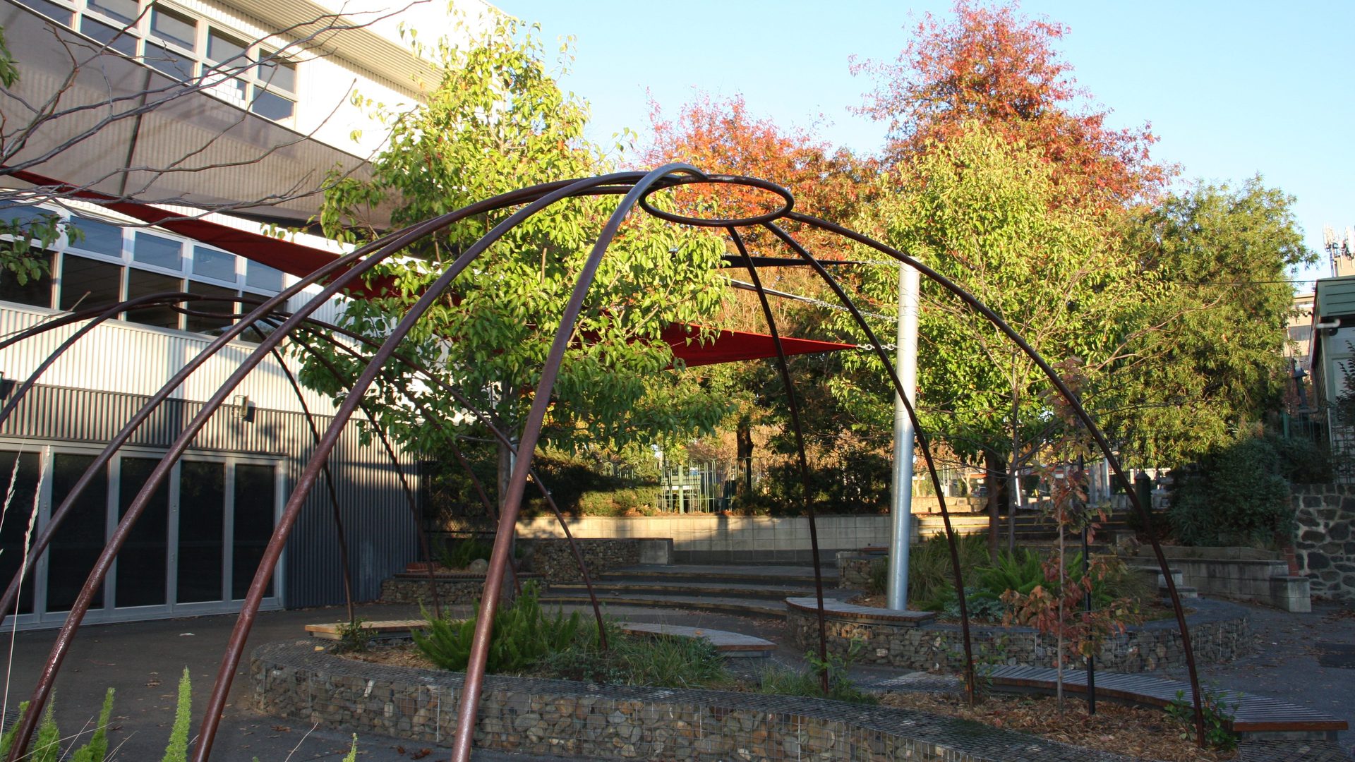 Outdoor dome sculpture and landscaped courtyard at Camberwell Primary School