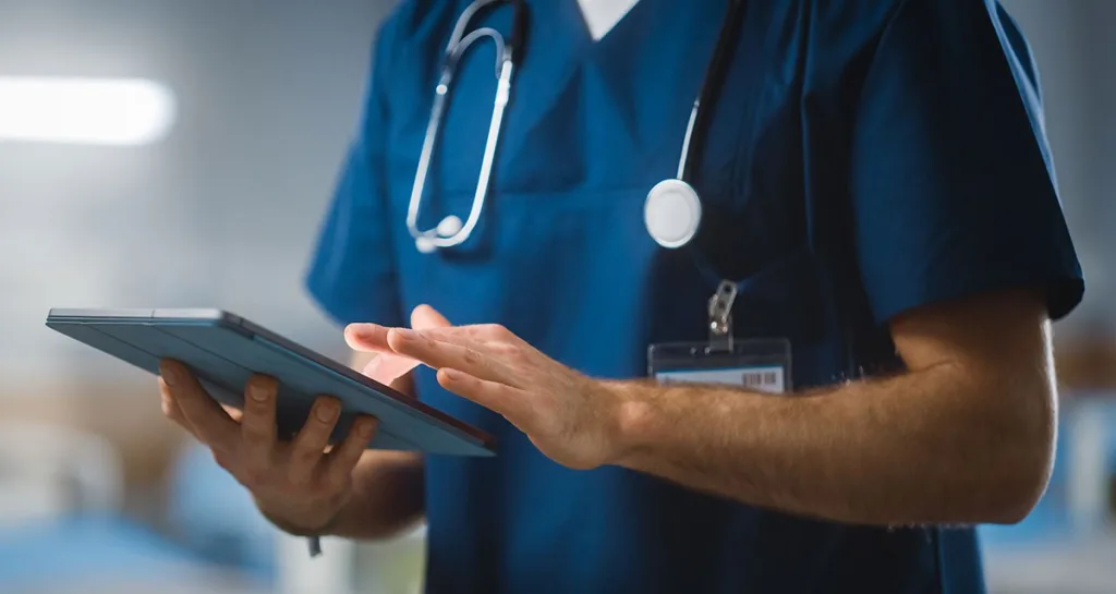 Informatics nurse working on tablet