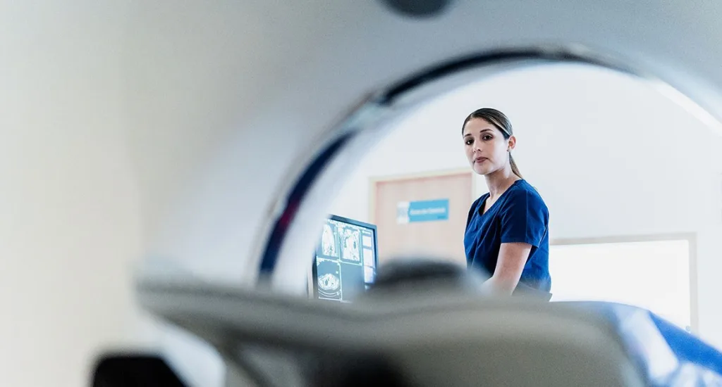 Radiology nurse helping a patient