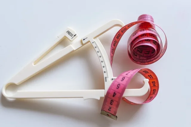 Image of calipers and tape measure to user BMI formula