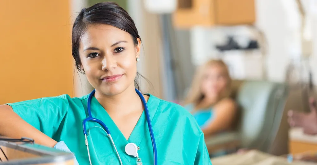 Nurse standing at counter