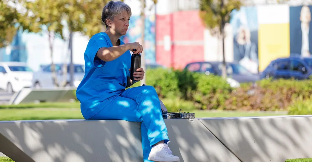 Nurse takes a break to hydrate