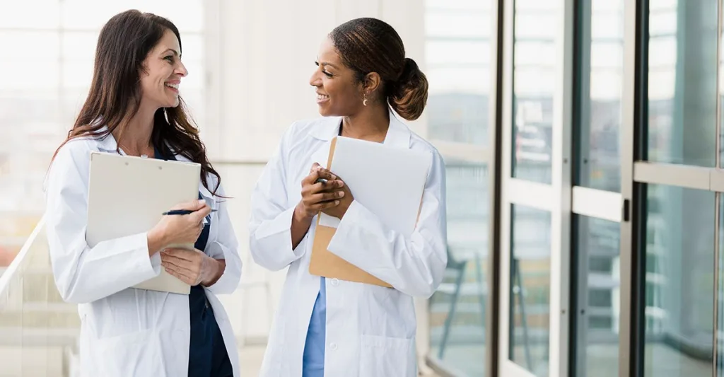 Two women in lab coats