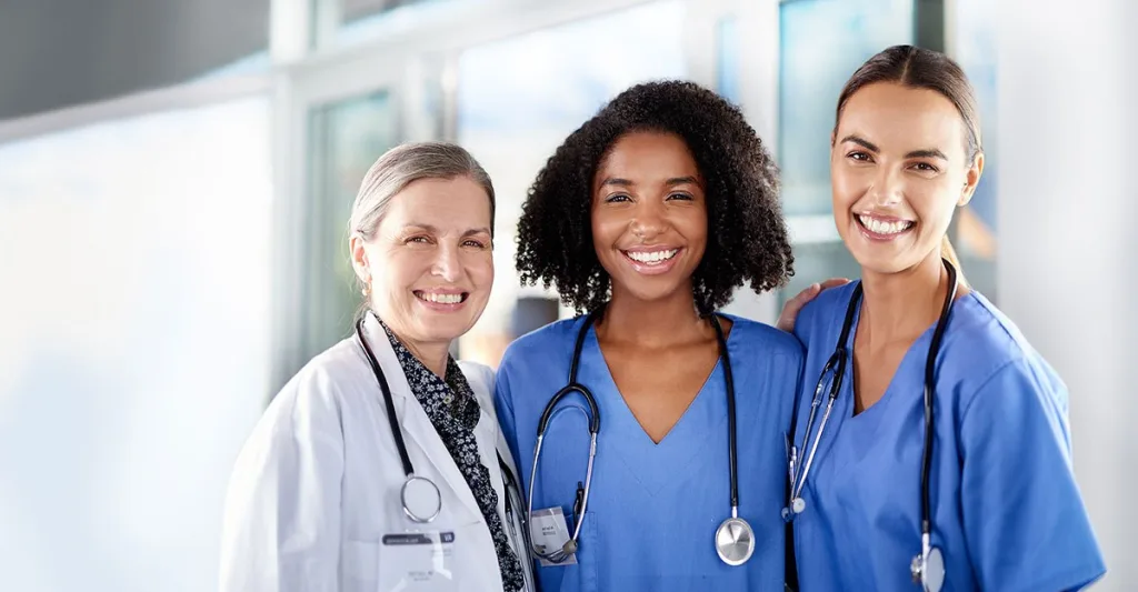 3 smiling nurses