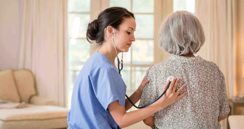 Nurse using stethoscope