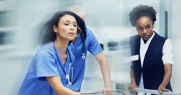 Nurse rushing patient to get care