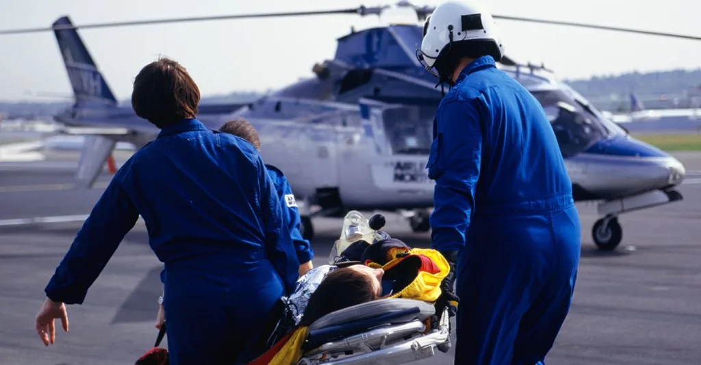 flight nurse working with a team