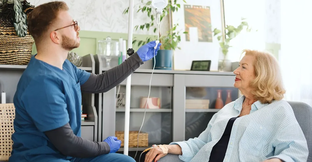 home infusion nurse with patient