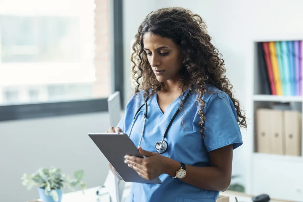 nurse with ipad