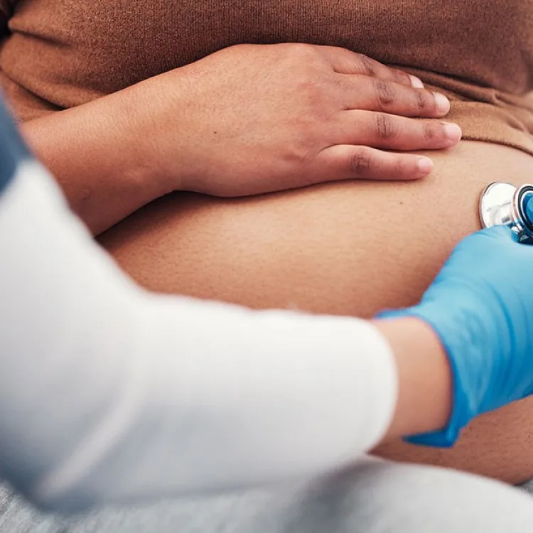 Nurse with pregnant person