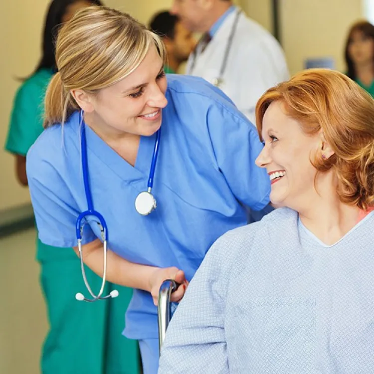 Nurse with patient in wheelchair