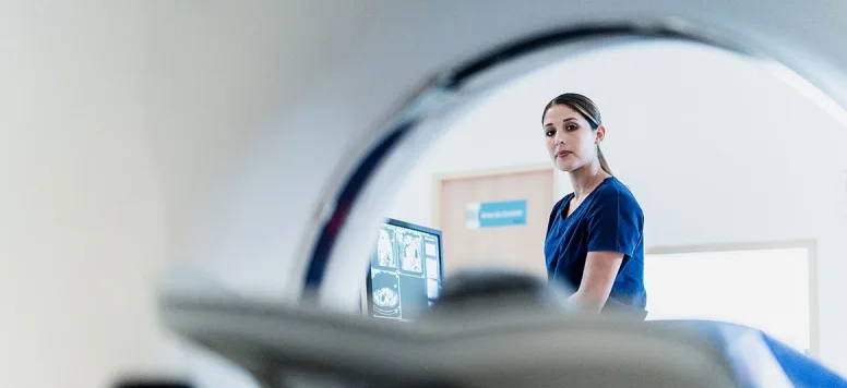 Radiology nurse helping a patient