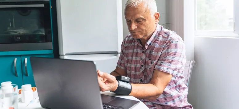 Man checking his vitals and using AI nursing assistant