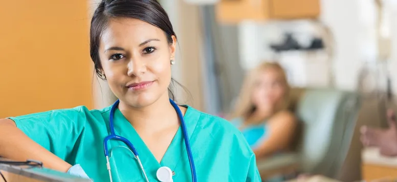 Nurse standing at counter