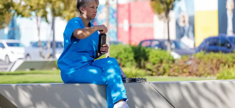 Nurse takes a break to hydrate